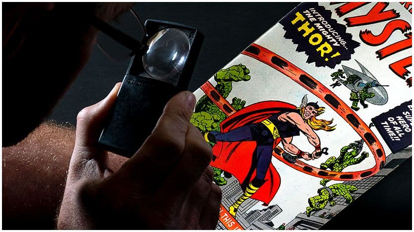 Close up of CGC grader inspecting a comic