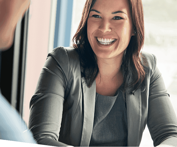 Smiling woman in suit