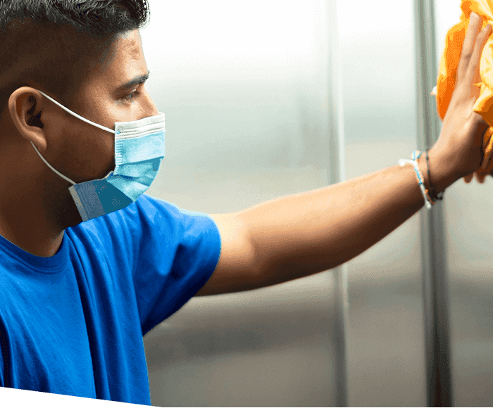 Man wiping down surface