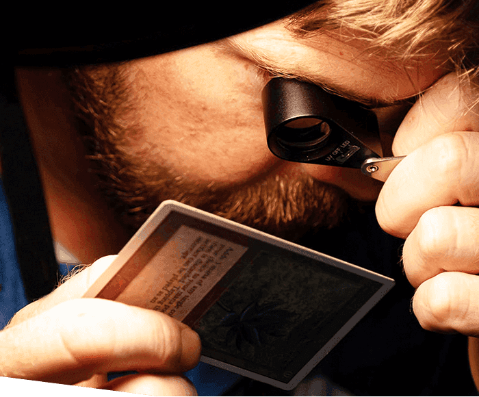 Man inspecting card